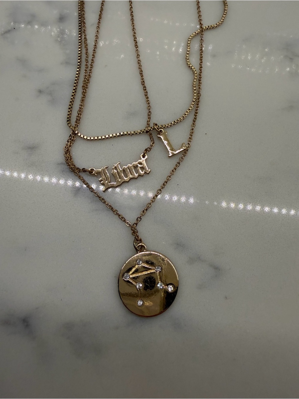Gold Layered Libra necklaces and keychain